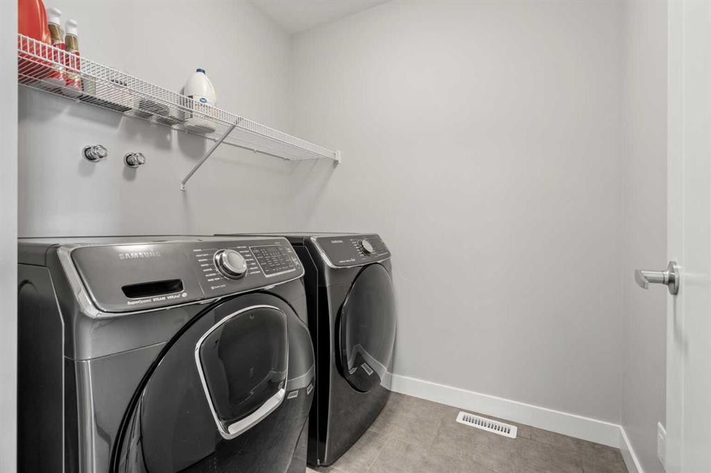 11 Masters Manor Se, Calgary, AB - Indoor Photo Showing Laundry Room