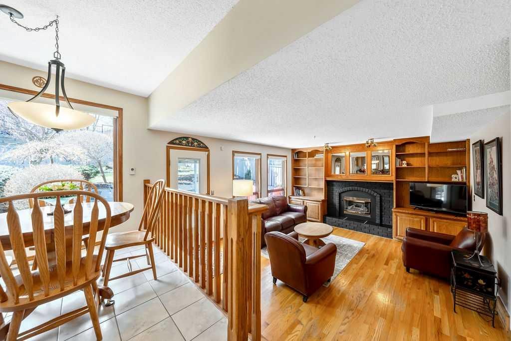 5019 Norris Road Nw, Calgary, AB - Indoor With Fireplace