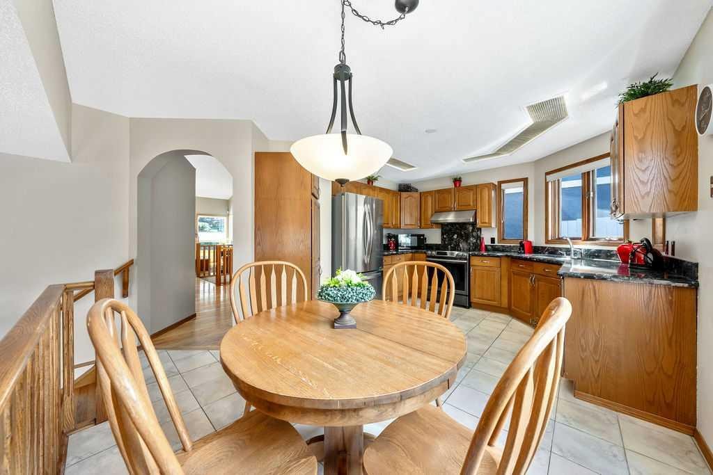 5019 Norris Road Nw, Calgary, AB - Indoor Photo Showing Dining Room