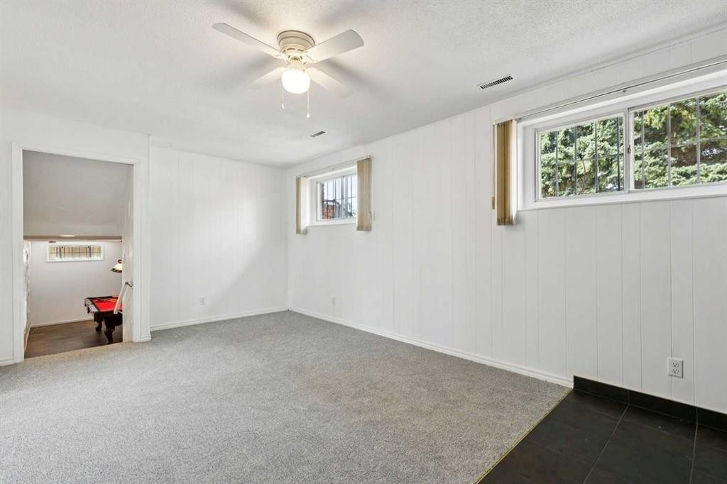 12 Huntwick Way Ne, Calgary, AB - Indoor Photo Showing Other Room
