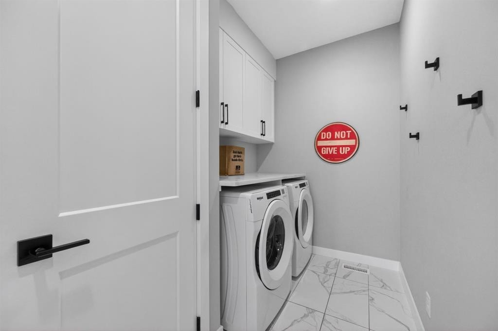 46 Crestridge Bay Sw, Calgary, AB - Indoor Photo Showing Laundry Room