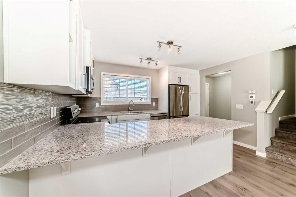 393 Legacy Boulevard Se, Calgary, AB - Indoor Photo Showing Kitchen With Upgraded Kitchen