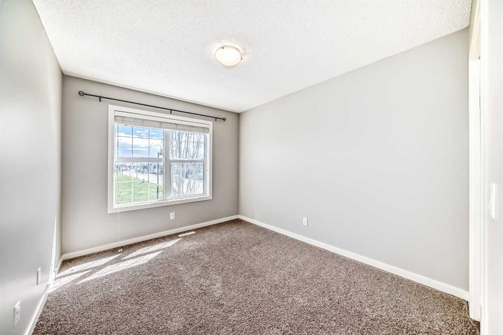393 Legacy Boulevard Se, Calgary, AB - Indoor Photo Showing Other Room