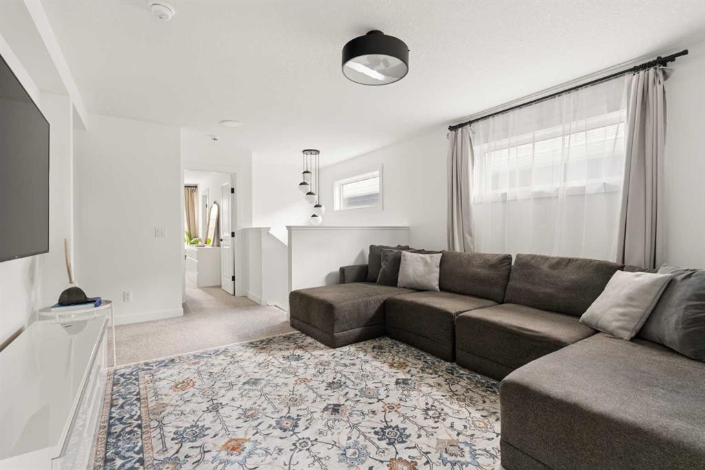 345 Calhoun Common Ne, Calgary, AB - Indoor Photo Showing Living Room