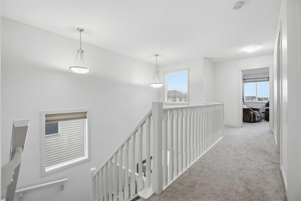 107 Everwoods Park Sw, Calgary, AB - Indoor Photo Showing Other Room