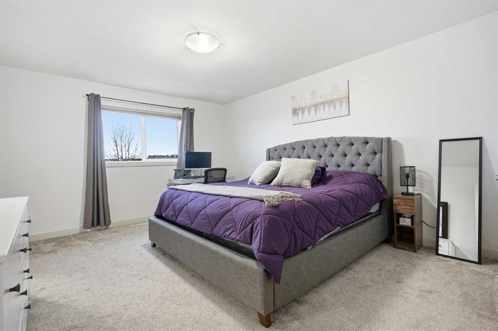 107 Everwoods Park Sw, Calgary, AB - Indoor Photo Showing Bedroom