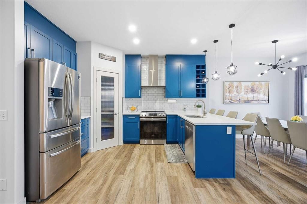 107 Everwoods Park Sw, Calgary, AB - Indoor Photo Showing Kitchen With Upgraded Kitchen