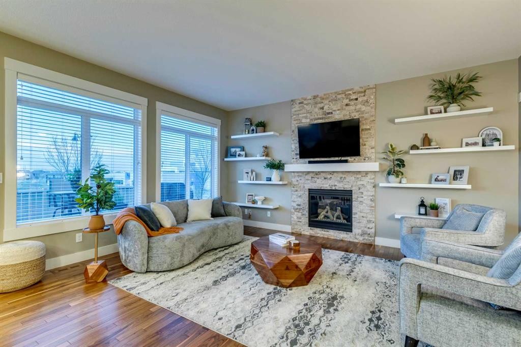 490 Mahogany Manor Se, Calgary, AB - Indoor Photo Showing Living Room With Fireplace