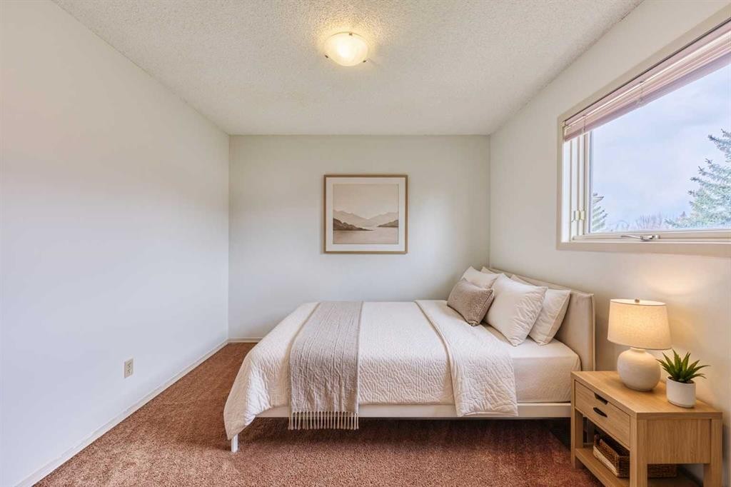 243 Hampshire Close Nw, Calgary, AB - Indoor Photo Showing Bedroom