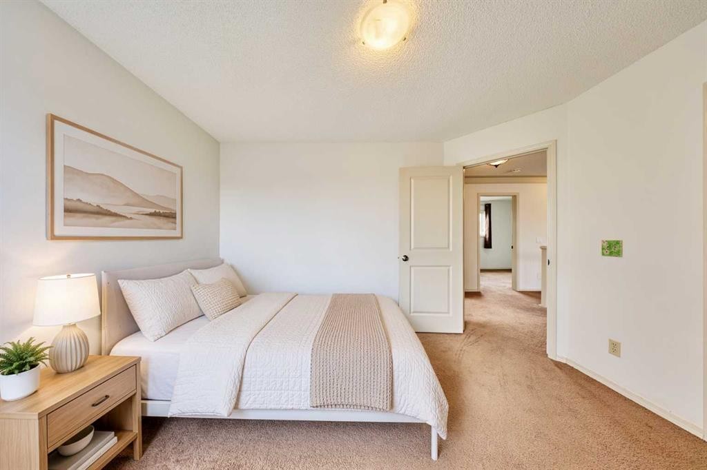 243 Hampshire Close Nw, Calgary, AB - Indoor Photo Showing Bedroom