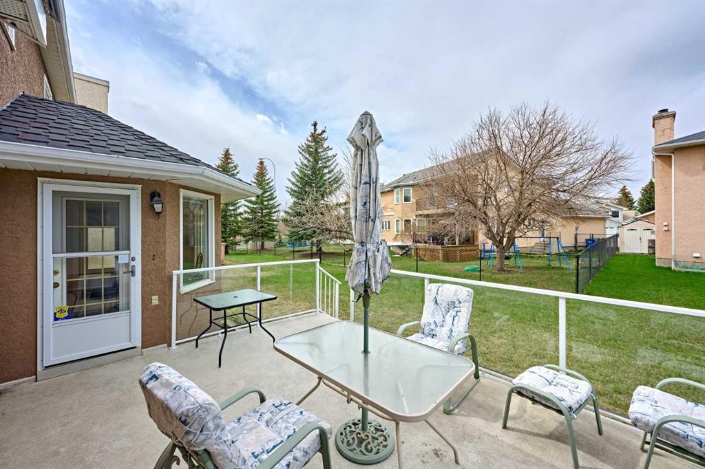 243 Hampshire Close Nw, Calgary, AB - Outdoor With Deck Patio Veranda With Exterior