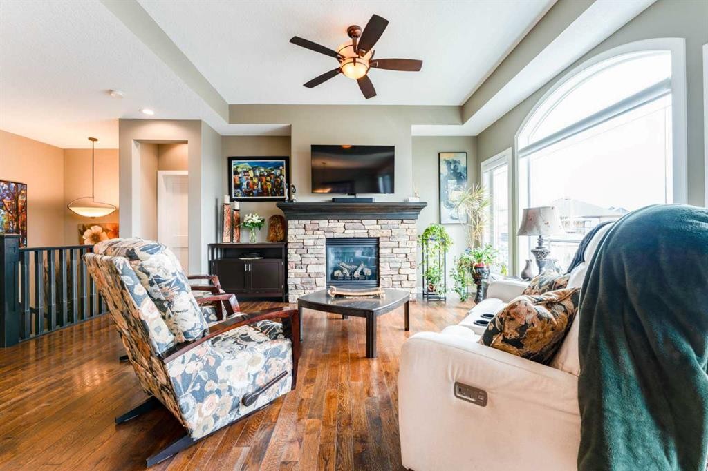149 Muirfield Boulevard, Lyalta, AB - Indoor Photo Showing Living Room With Fireplace