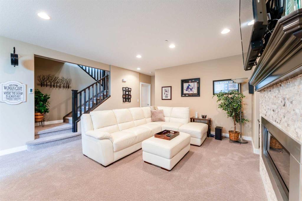 149 Muirfield Boulevard, Lyalta, AB - Indoor Photo Showing Living Room With Fireplace