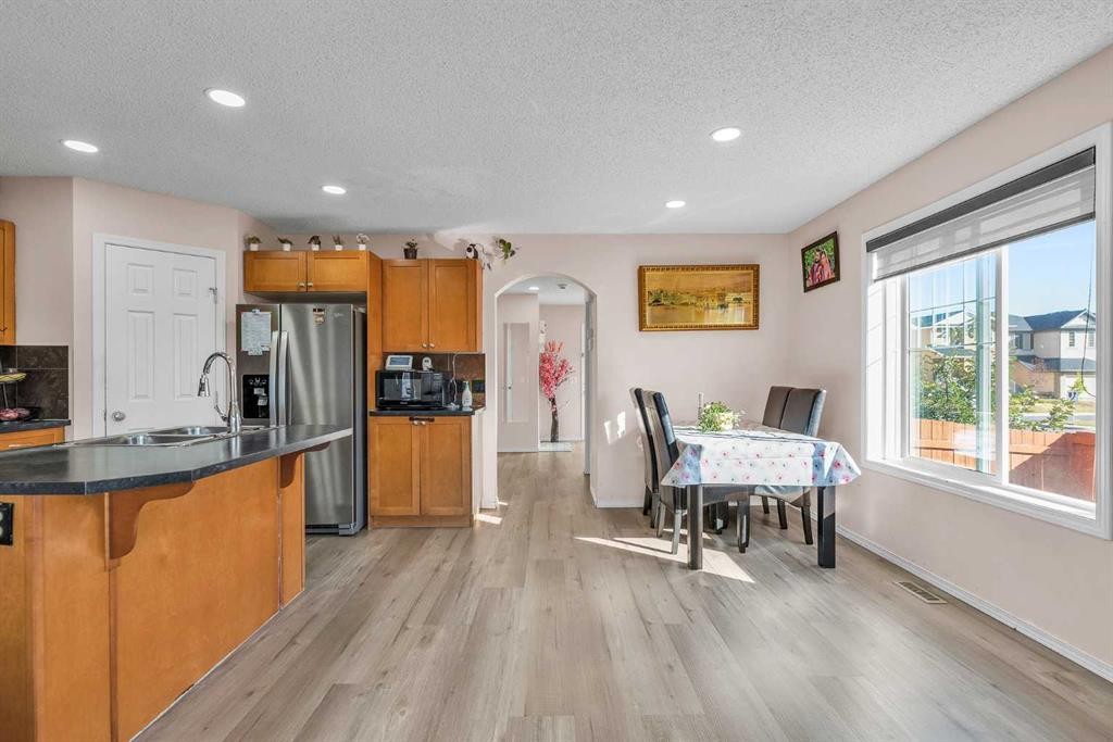 61 Taralake Street Ne, Calgary, AB - Indoor Photo Showing Kitchen With Double Sink