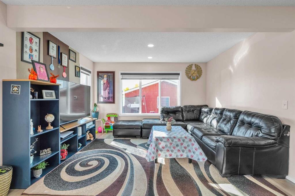 61 Taralake Street Ne, Calgary, AB - Indoor Photo Showing Living Room
