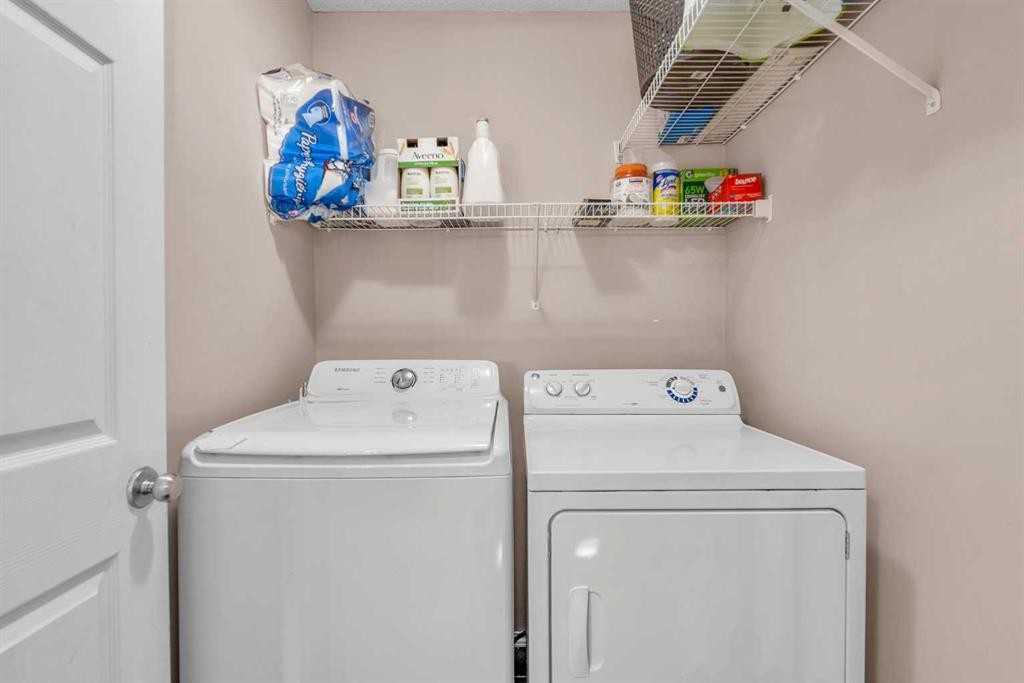 61 Taralake Street Ne, Calgary, AB - Indoor Photo Showing Laundry Room