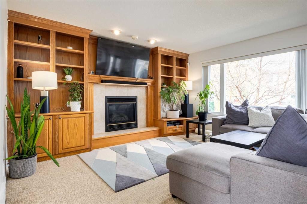 439 Mountain Park Drive Se, Calgary, AB - Indoor Photo Showing Living Room With Fireplace