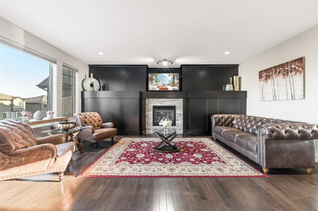 52 Aspen Summit Drive Sw, Calgary, AB - Indoor Photo Showing Living Room With Fireplace