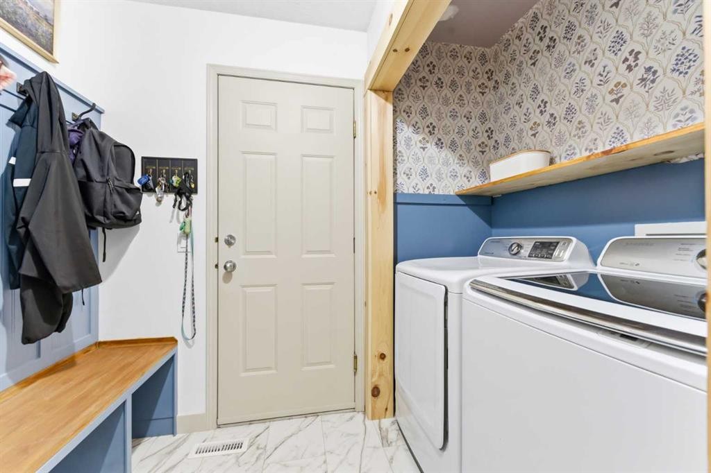 212 Cove Drive, Chestermere, AB - Indoor Photo Showing Laundry Room