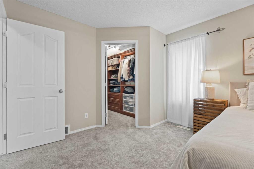 31 Brightondale Close Se, Calgary, AB - Indoor Photo Showing Bedroom