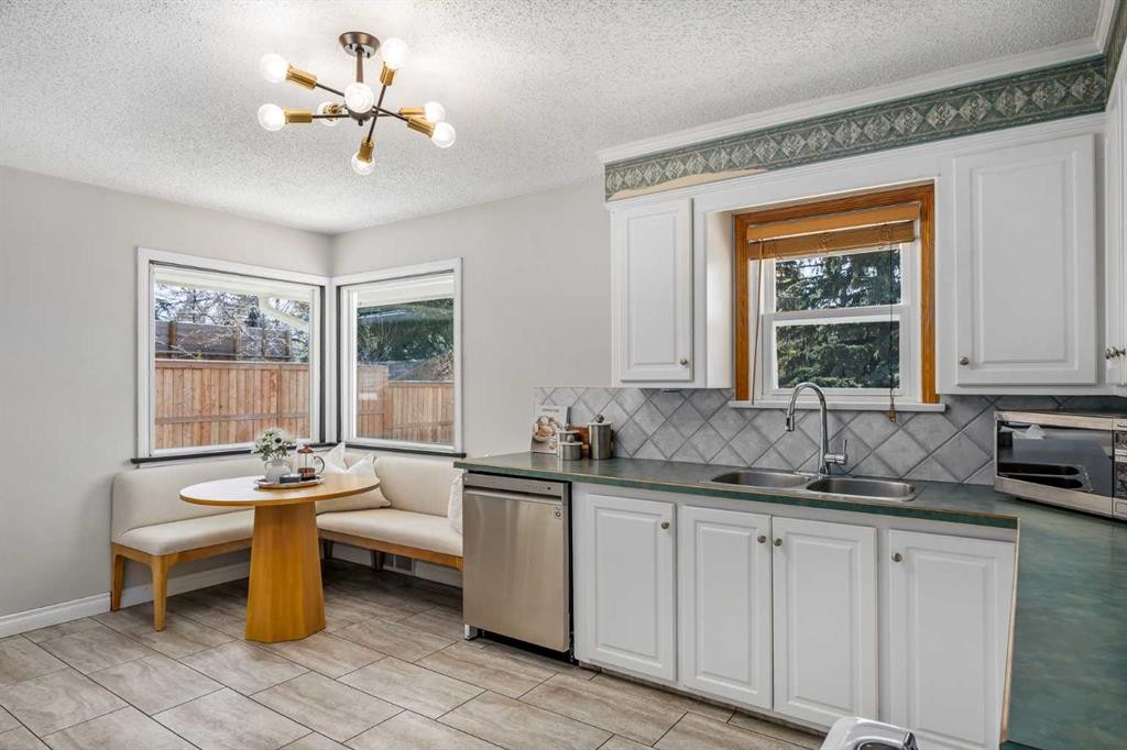 3003 25 Street Sw, Calgary, AB - Indoor Photo Showing Kitchen With Double Sink