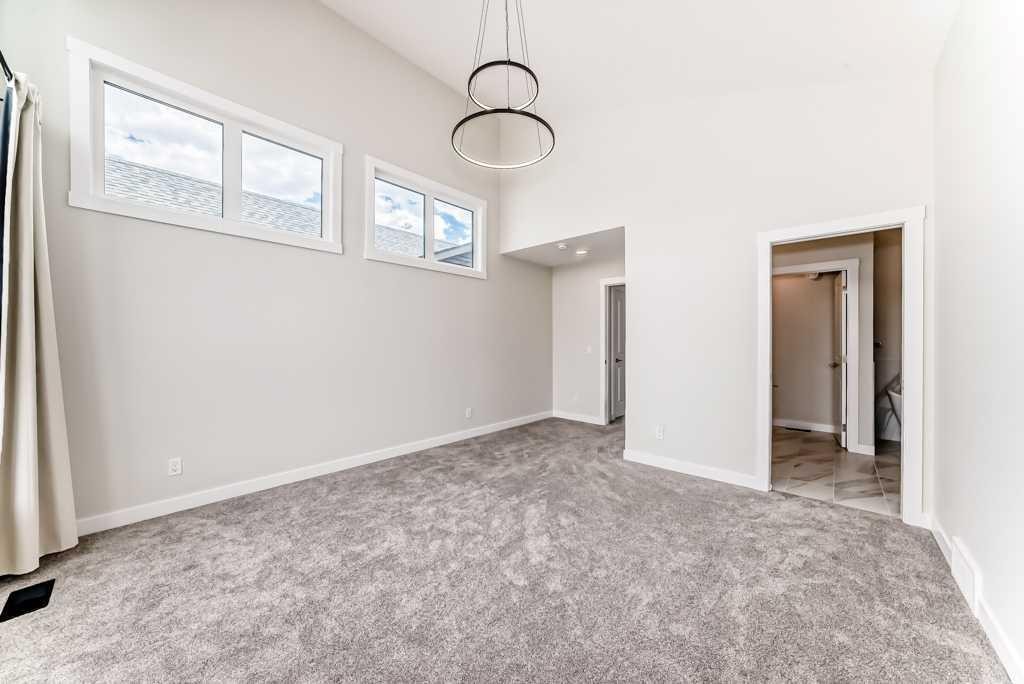 55 Silver Spruce Grove Sw, Calgary, AB - Indoor Photo Showing Other Room