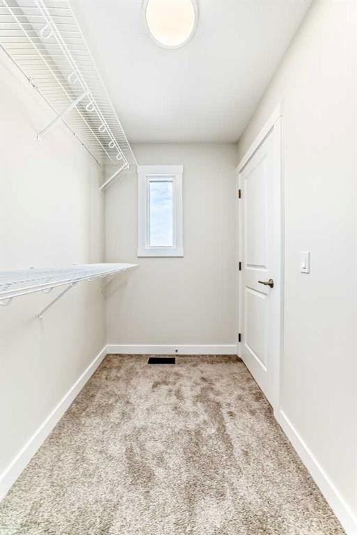 55 Silver Spruce Grove Sw, Calgary, AB - Indoor Photo Showing Other Room