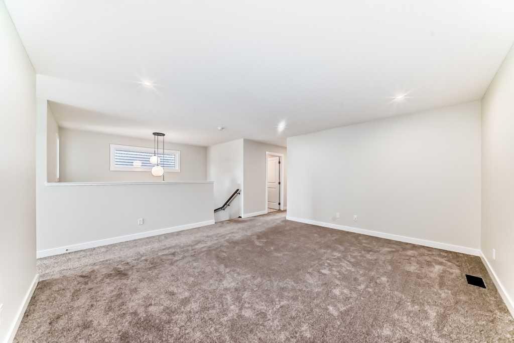 55 Silver Spruce Grove Sw, Calgary, AB - Indoor Photo Showing Other Room