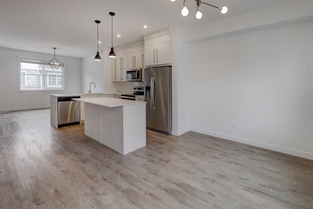 705-50 Cornerstone Passage Ne, Calgary, AB - Indoor Photo Showing Kitchen With Stainless Steel Kitchen With Upgraded Kitchen