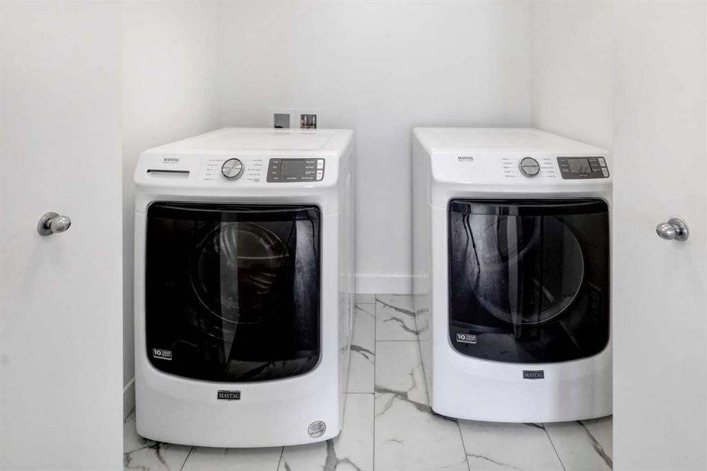 705-50 Cornerstone Passage Ne, Calgary, AB - Indoor Photo Showing Laundry Room