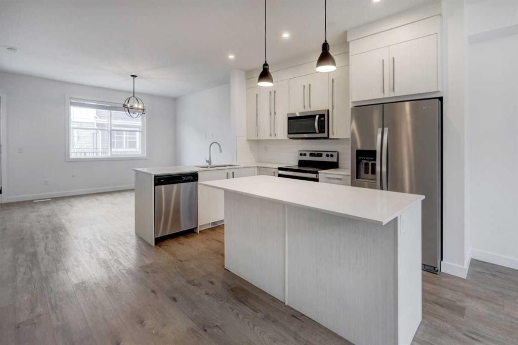 705-50 Cornerstone Passage Ne, Calgary, AB - Indoor Photo Showing Kitchen With Stainless Steel Kitchen With Upgraded Kitchen