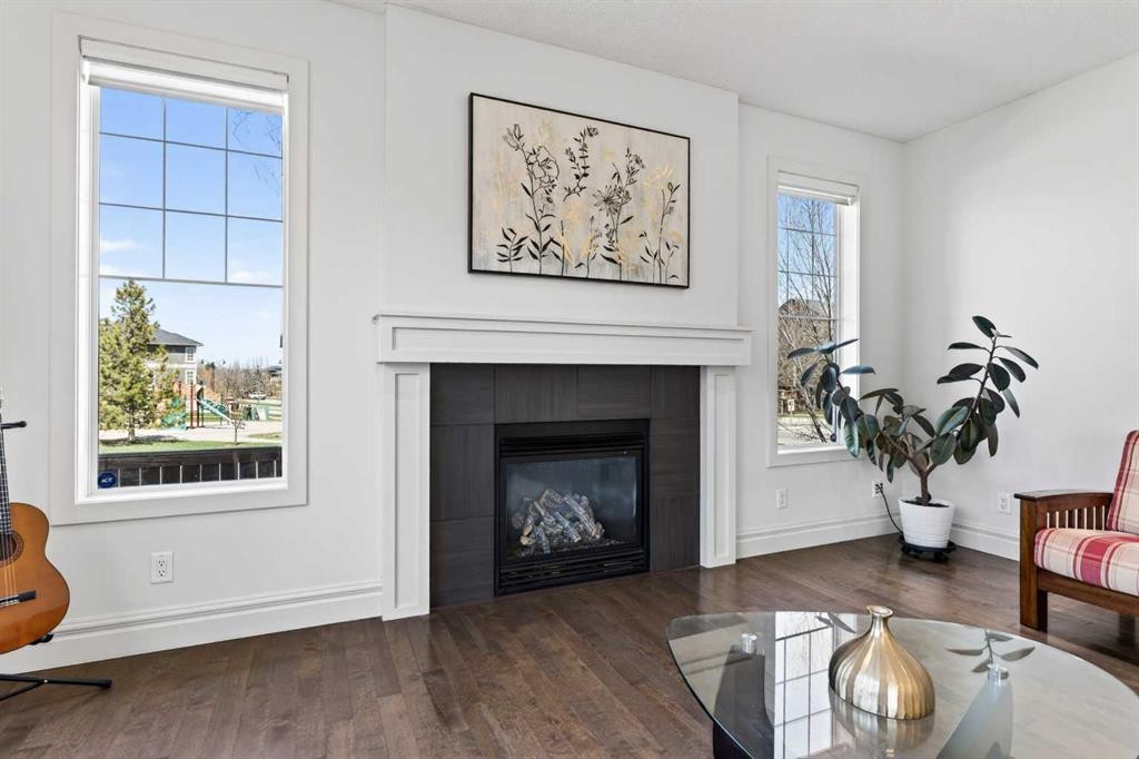 421 Auburn Bay Boulevard Se, Calgary, AB - Indoor Photo Showing Living Room With Fireplace