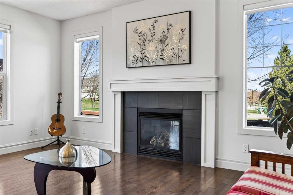 421 Auburn Bay Boulevard Se, Calgary, AB - Indoor Photo Showing Living Room With Fireplace