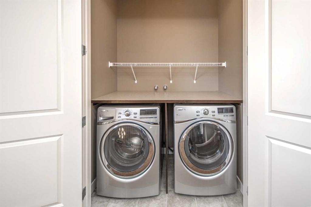 10 Aspenshire Place Sw, Calgary, AB - Indoor Photo Showing Laundry Room