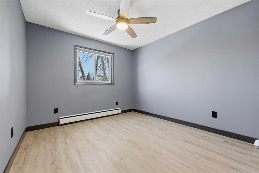 203-3103 Blakiston Drive Nw, Calgary, AB - Indoor Photo Showing Other Room