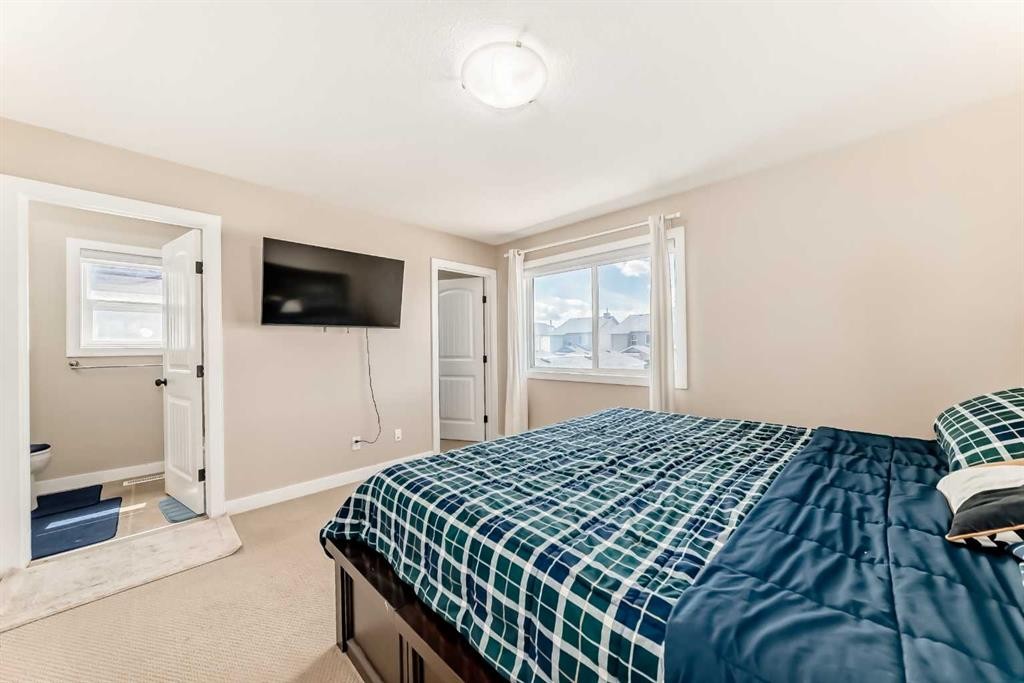 299 Saddlebrook Circle Ne, Calgary, AB - Indoor Photo Showing Bedroom