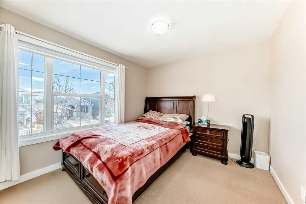 299 Saddlebrook Circle Ne, Calgary, AB - Indoor Photo Showing Bedroom