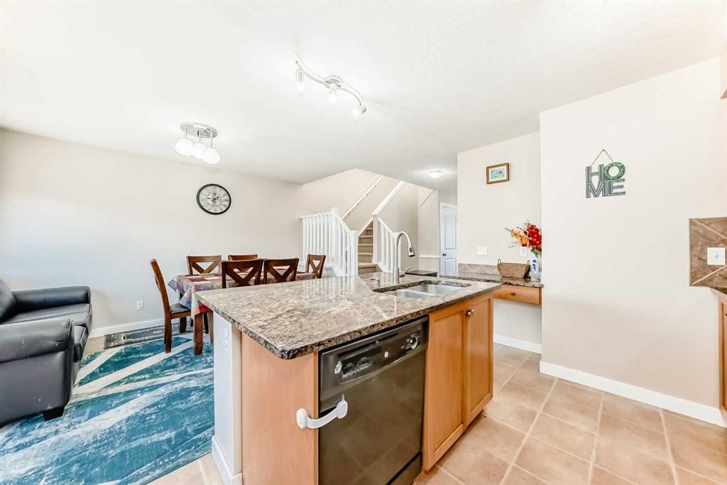 299 Saddlebrook Circle Ne, Calgary, AB - Indoor Photo Showing Kitchen With Double Sink