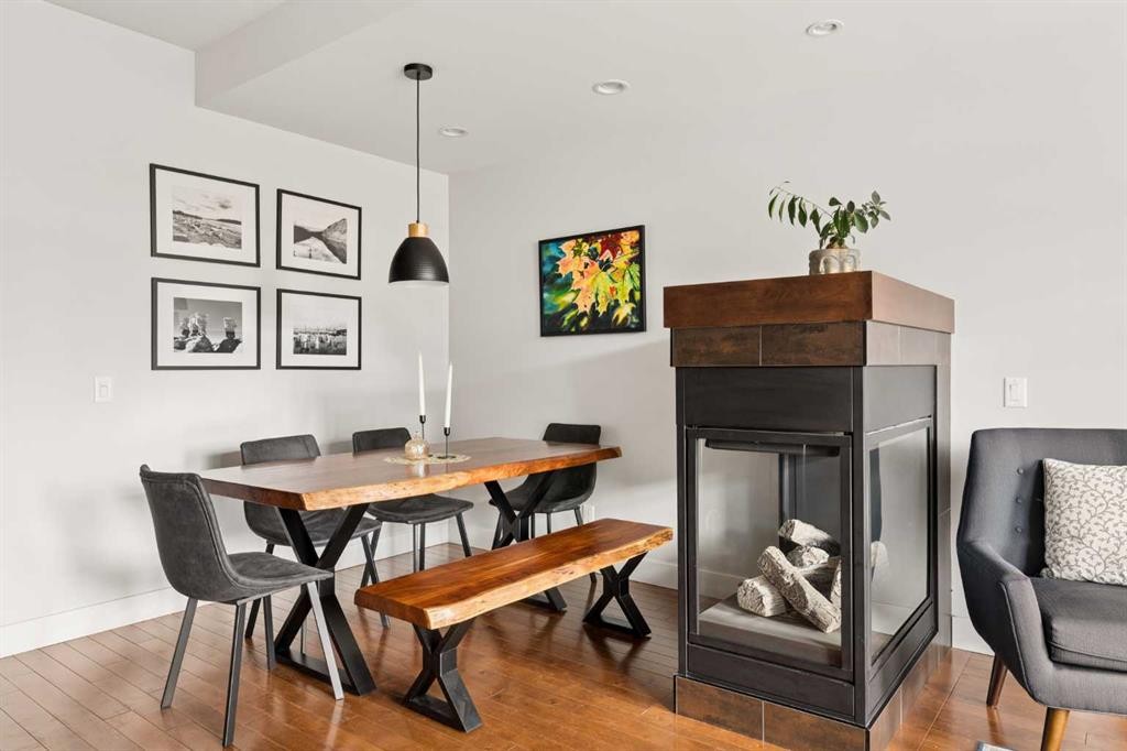 1825 33 Avenue Sw, Calgary, AB - Indoor Photo Showing Dining Room With Fireplace