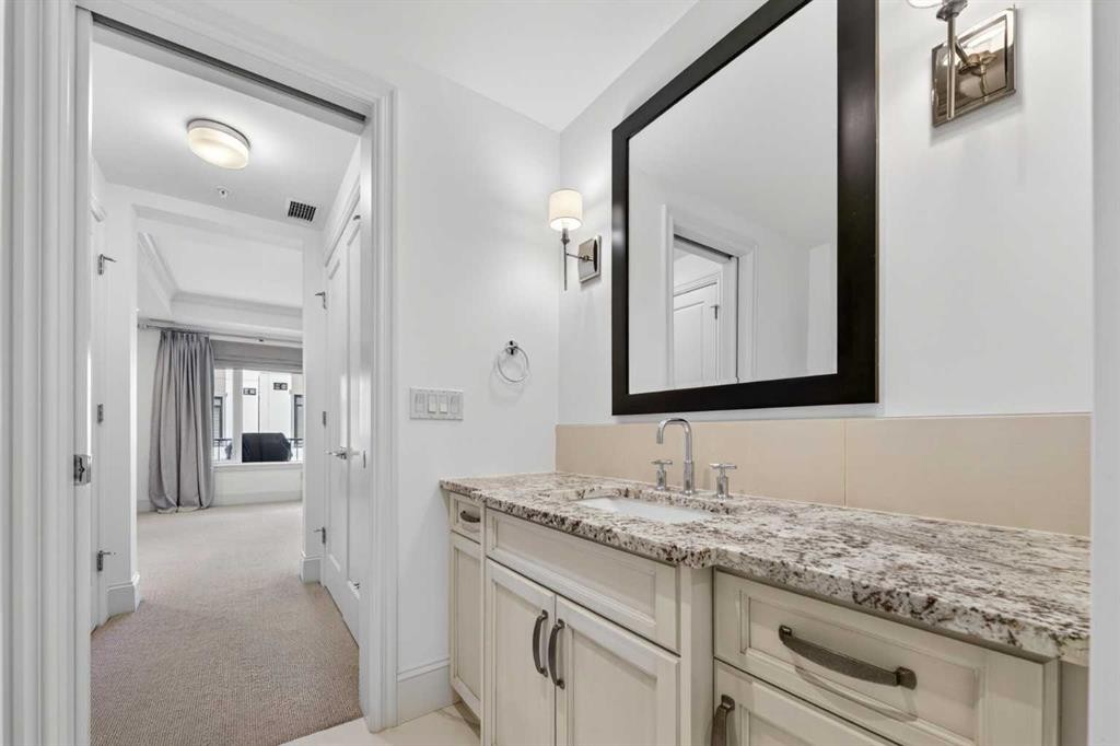 305-221 Quarry Way Se, Calgary, AB - Indoor Photo Showing Bathroom
