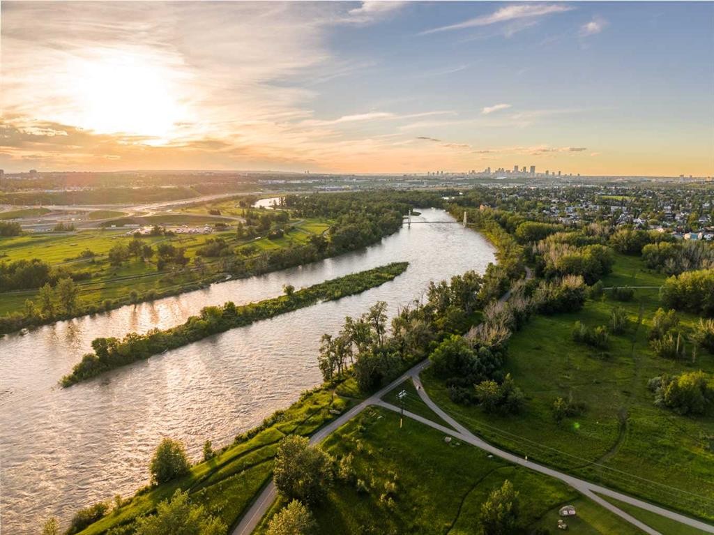 305-221 Quarry Way Se, Calgary, AB - Outdoor With Body Of Water With View