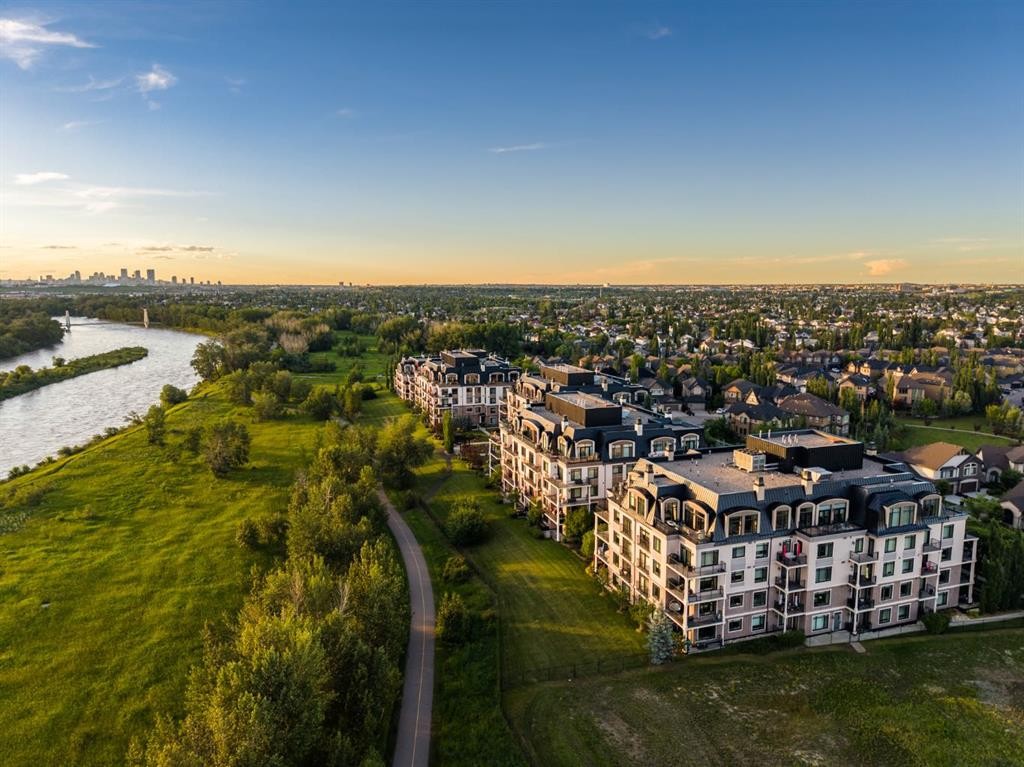 305-221 Quarry Way Se, Calgary, AB - Outdoor With Body Of Water With View