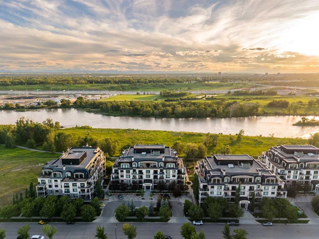 305-221 Quarry Way Se, Calgary, AB - Outdoor With Body Of Water With View