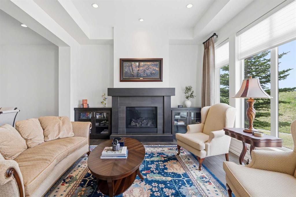 117 Spring Water Close, Heritage Pointe, AB - Indoor Photo Showing Living Room With Fireplace