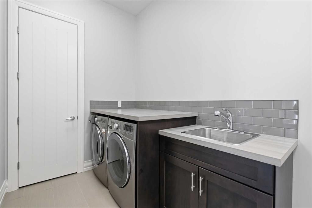 117 Spring Water Close, Heritage Pointe, AB - Indoor Photo Showing Laundry Room