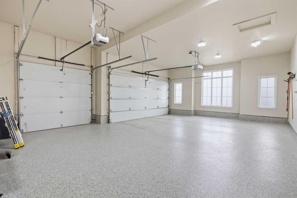 117 Spring Water Close, Heritage Pointe, AB - Indoor Photo Showing Garage