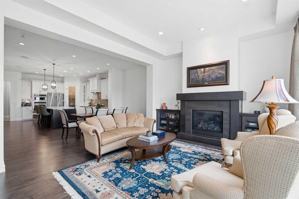 117 Spring Water Close, Heritage Pointe, AB - Indoor Photo Showing Living Room With Fireplace