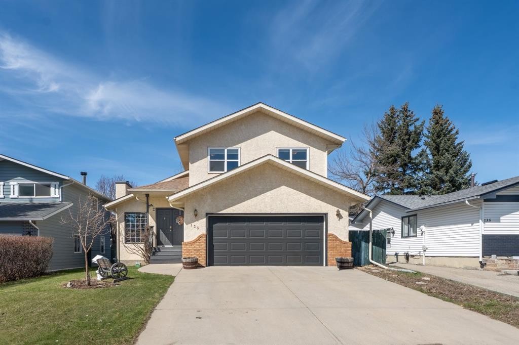 133 Carr Crescent, Okotoks, AB - Outdoor With Facade