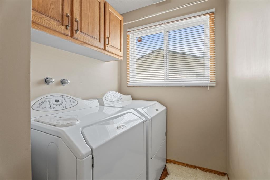 133 Carr Crescent, Okotoks, AB - Indoor Photo Showing Laundry Room