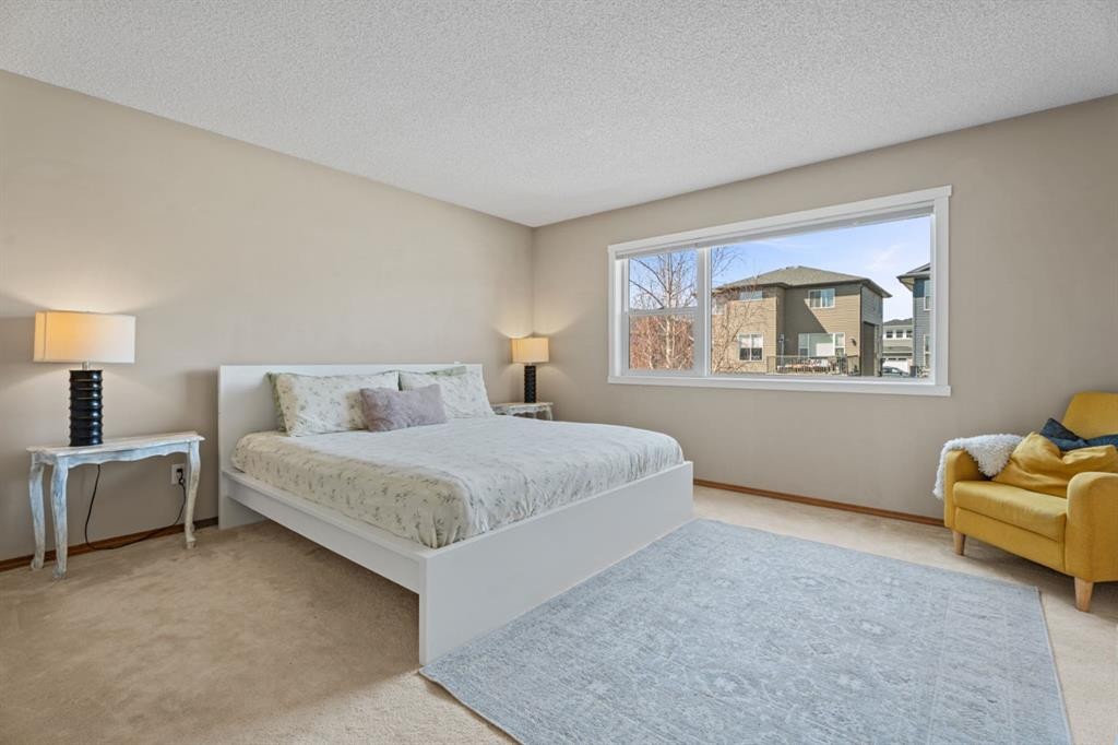 133 Carr Crescent, Okotoks, AB - Indoor Photo Showing Bedroom